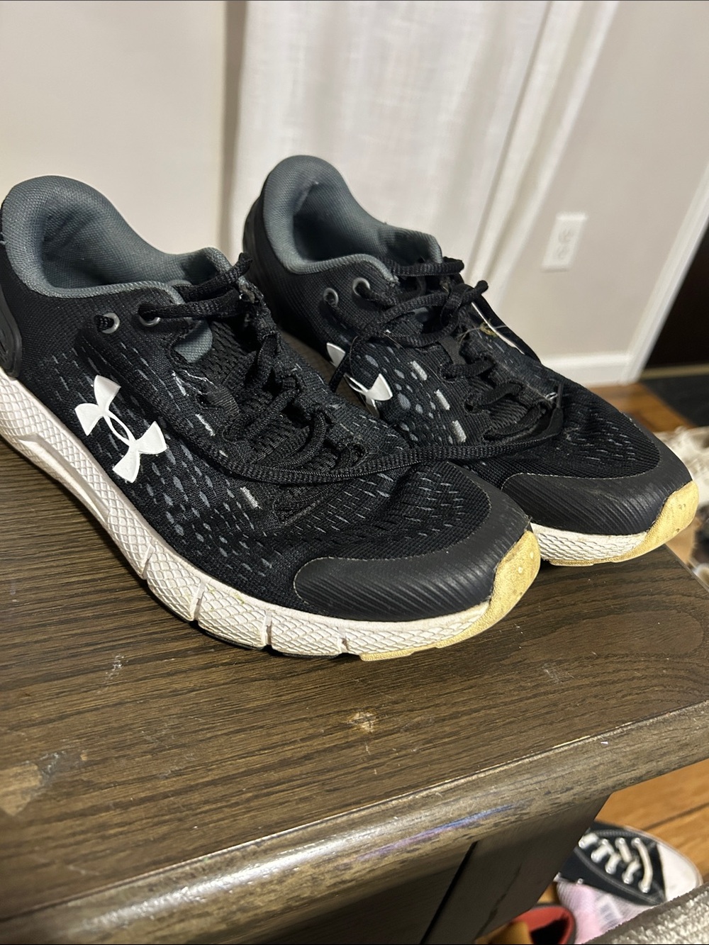 Under Armour Black and White Athletic Sneakers Charged Rogue